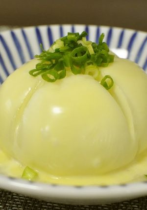 A picture of Microwaved Steamed Sweet Onion with Shiro-Dashi & Cheese.