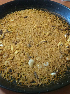 Una foto de Paella fina de pulpitos y gambitas