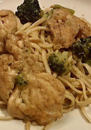 A picture of Chicken with broccoli and cheese linguini.