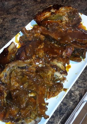 A picture of Fall off the bone crockpot ribs.