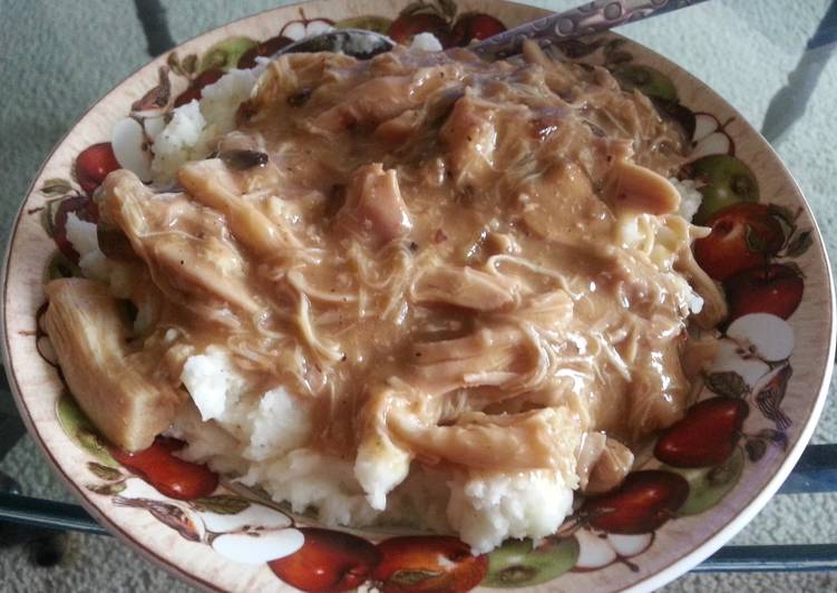 Chicken and gravy over mashed potatoes