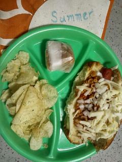 A picture of Hotdog with Spaghetti - Os.