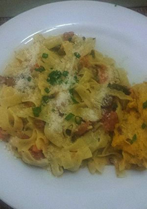 A picture of Creamy Fettuccine Pasta with Chorizo Sausage and Jerk Chicken.
