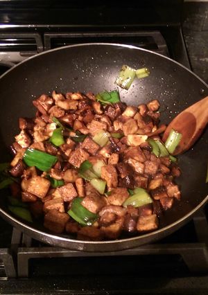 A picture of Fried Tofu with Pork Belly, Mushrooms and Leeks.