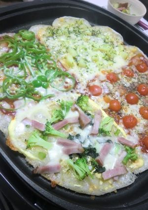 A picture of Mochi Pizza With Four Toppings.