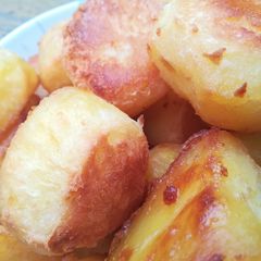 A picture of Roast potatoes with duck fat.