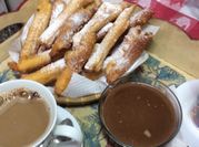 Una foto de churros dulces