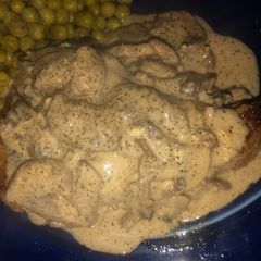 A picture of Mozzarella Portobello Parmesan smothered sirloin steak.