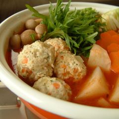 A picture of Cheesy Chicken Meatballs in a Western-Style Hot Pot.