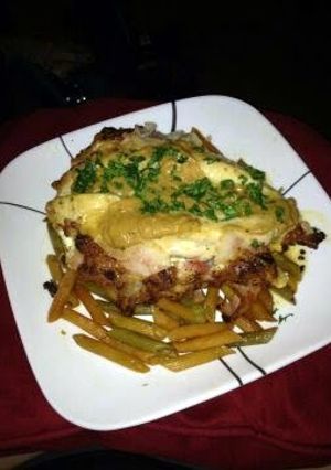 A picture of Stuffed chicken on panini.