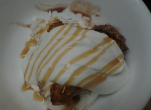 A picture of Caramelized Bananas with Ice Cream and Homemade Whipped topping.