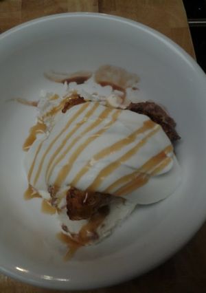A picture of Caramelized Bananas with Ice Cream and Homemade Whipped topping.