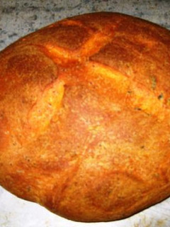 A picture of Totally incredible Tomato Basil bread.