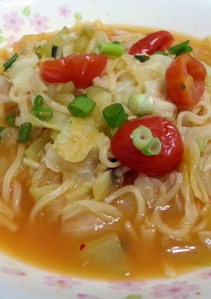 A picture of Cabbage And Tomato In Noodle Soup.