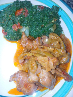 A picture of Chicken stew with pumpkin leaves.