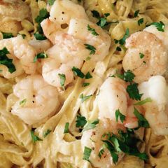 A picture of Creamy Pasta Alfredo With Shrimp Scampi.