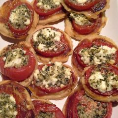A picture of Tomato tart with goat cheese & pesto.