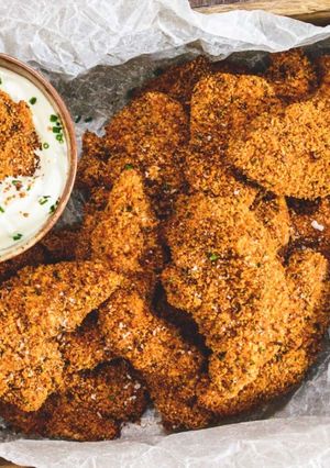 A picture of Oven-Baked Chicken Dippers with a Creamy Chive Dip.