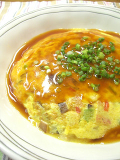 A picture of Fluffy, Creamy Chinese Style Crab Omelette with Sweet Vinegar Sauce.