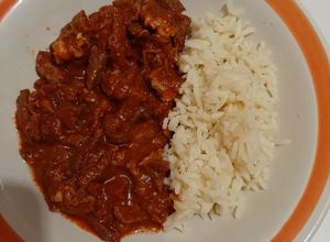 Una foto de Bistec en salsa de tomate guaje asado