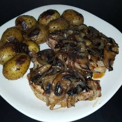 A picture of Cast Iron Pork Chops with Onions & Mushrooms.
