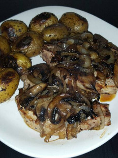 A picture of Cast Iron Pork Chops with Onions & Mushrooms.