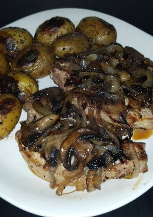A picture of Cast Iron Pork Chops with Onions & Mushrooms.