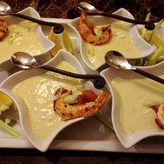 A picture of Starter Avocado Soup with Spicy Grilled Shrimp.