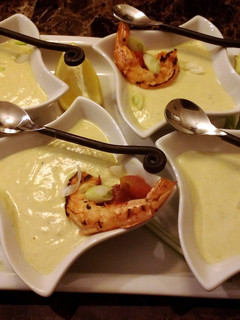 A picture of Starter Avocado Soup with Spicy Grilled Shrimp.