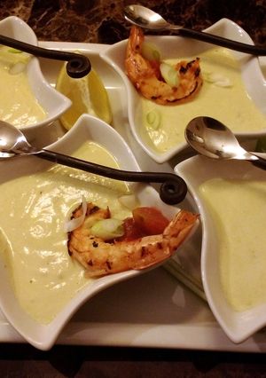 A picture of Starter Avocado Soup with Spicy Grilled Shrimp.