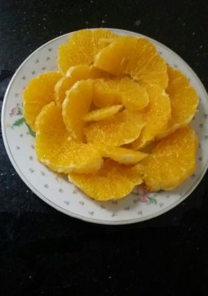 صورة لوصفة طريقة تقديم البرتقال على شكل وردة
