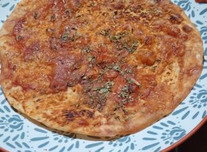 Una foto de Pizza con Rapiditas