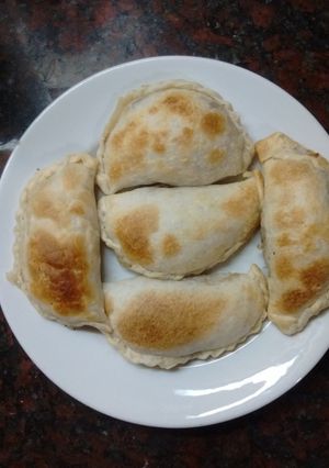 Una foto de Empanadas de jamón y queso al horno