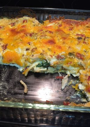 A picture of Chicken and spinach enchilada dinner casserole.