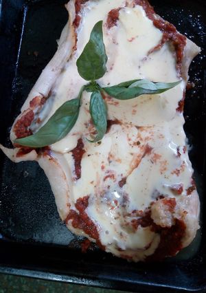 Una foto de Matambrito de cerdo a la pizza