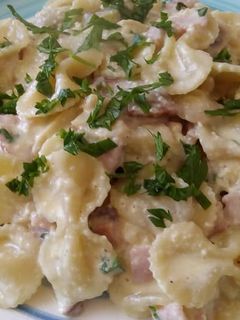 Una foto de Pasta a la crema de champiñones