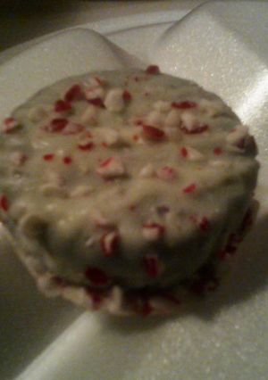 A picture of White Chocolate Dipped Oreos with Peppermint Crunchies.