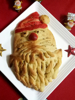 A picture of Garlic Bread Santa.