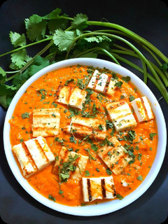 A picture of Grilled Paneer in Peanut tomato gravy.