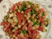 A picture of olives and scallions