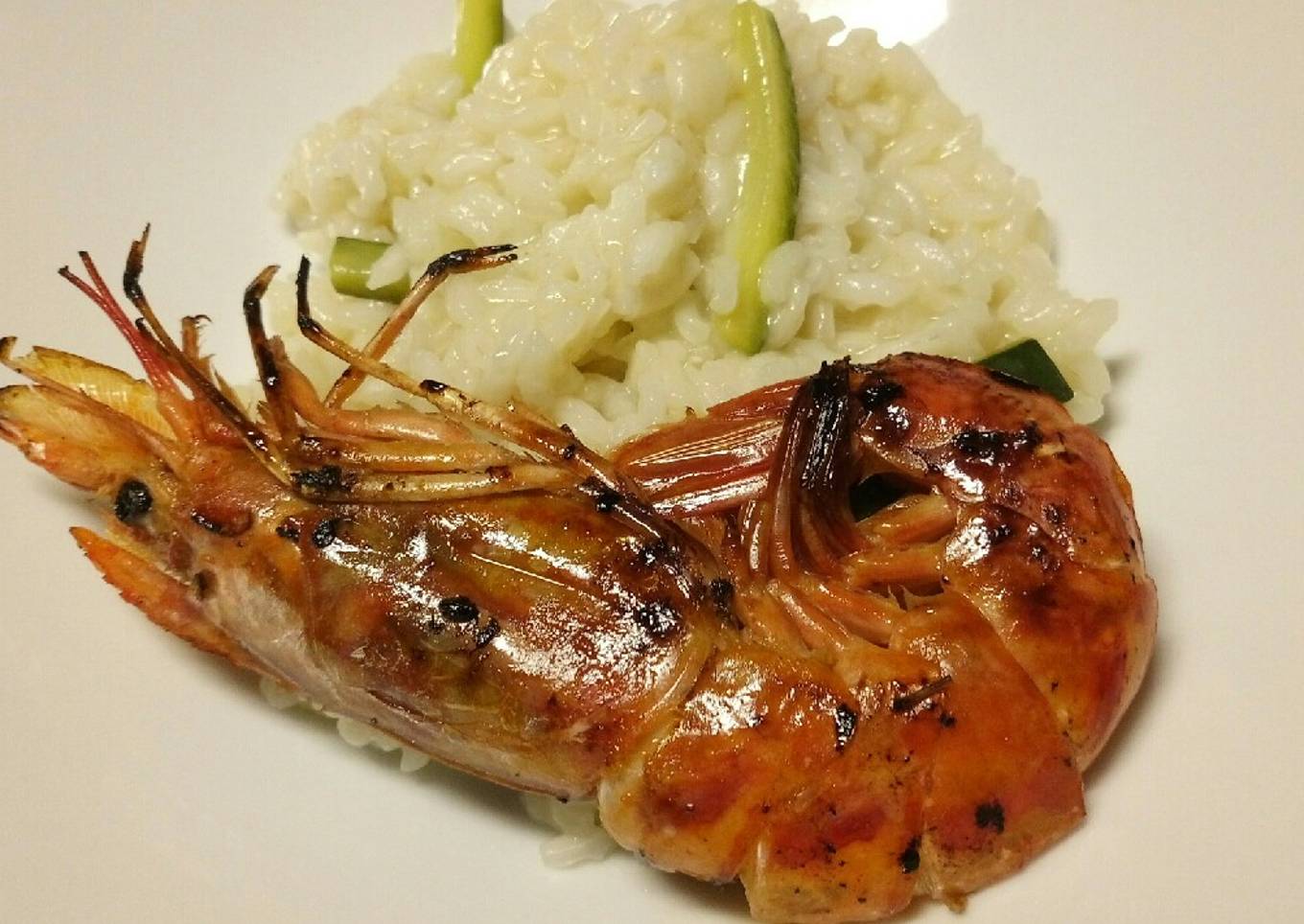 Risotto con zucchine e gamberone sulla griglia
