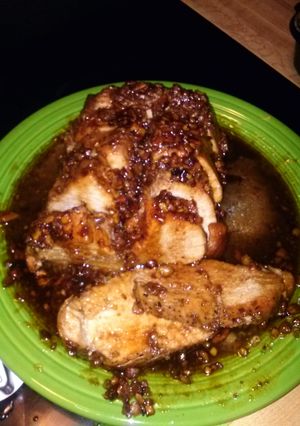 A picture of Pork Tenderloin W/Brown Sugar Honey & Pecan Glaze.