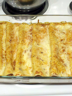A picture of Chicken Enchiladas.
