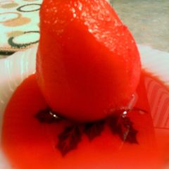 A picture of punch kool-aid braised pear.