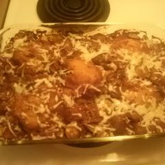 A picture of Chicken thighs w/ rice.