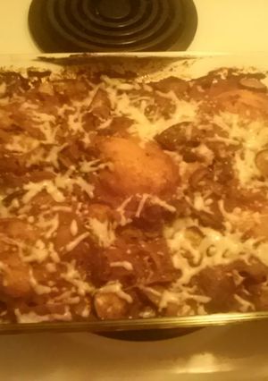 A picture of Chicken thighs w/ rice.
