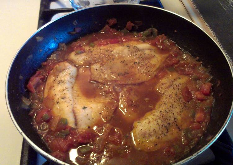 Filet of fish in arubian saus