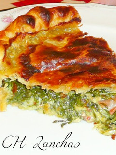 Una foto de Pastel de espinacas y langostinos
