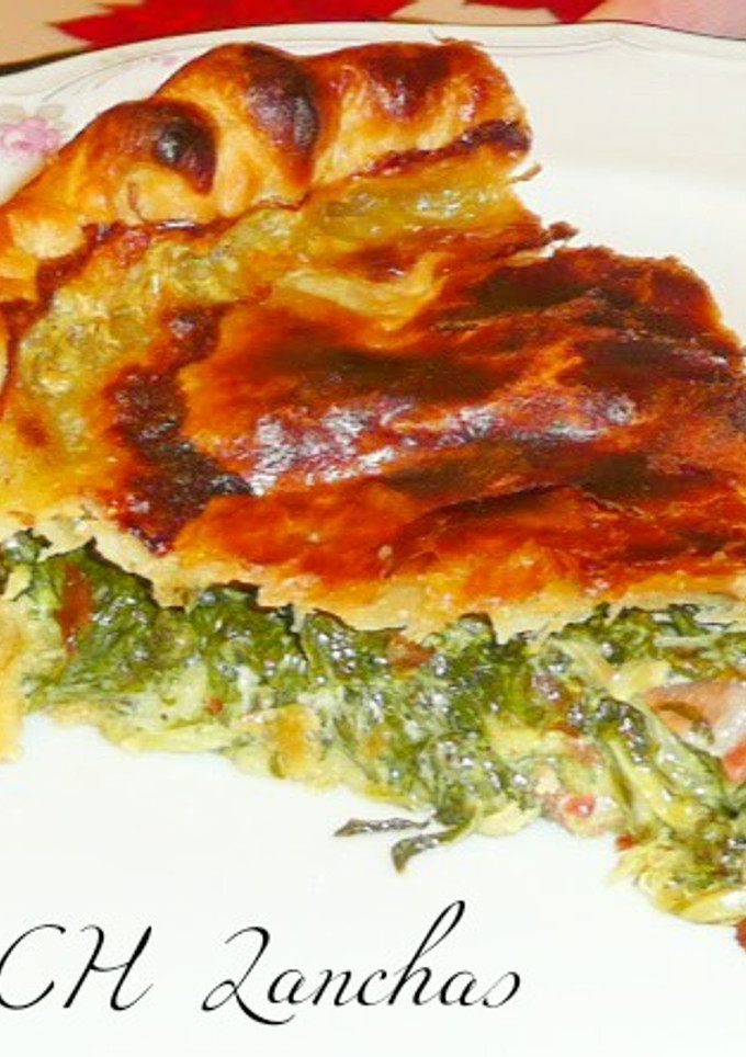 Una foto de Pastel de espinacas y langostinos