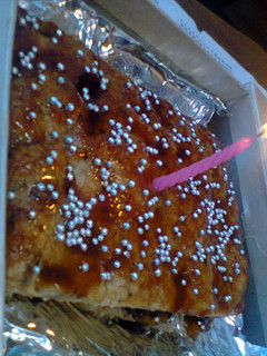 A picture of apple coffee cake with caramel sauce.
